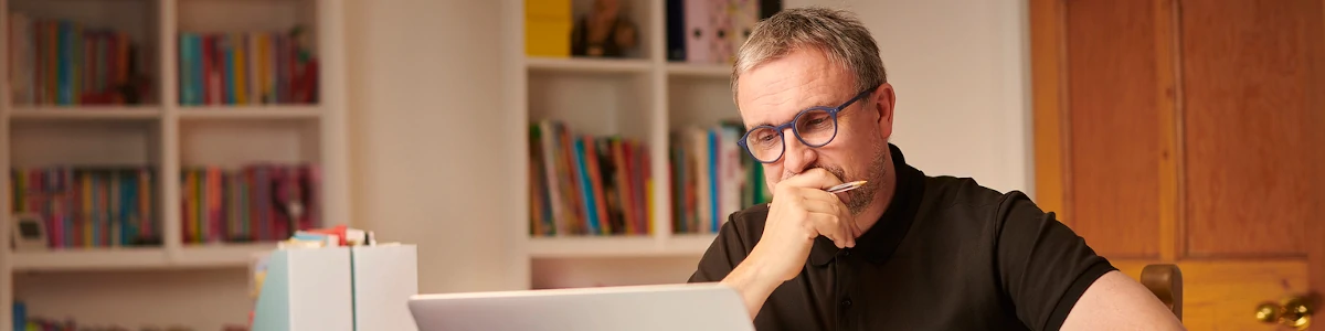 Tax accountant using a computer to prepare a tax return